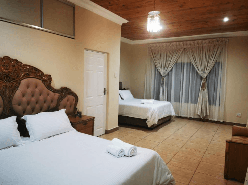 Deluxe Guest Room, 2 Queen Twins at KwaNomzi Boutique Lodge